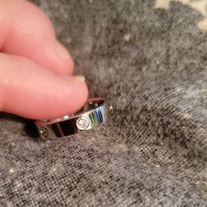 Cartier Silver Ring with Diamond Accents